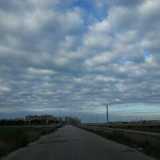 Foto panoramica scattata dalla strada parallela al corso del canalone di San Girolamo:il quartiere in lontananza, il canalone infondo a destra