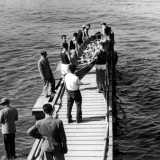 ...l� due pontili in legno lunghi 25 metri permettevano l�ingresso in acqua ai canottieri