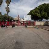 Lo Stadio del Nuoto si trova nel quartiere Marconi, adiacente all�Arena della Vittoria. Varchiamo il grande cancello rosso d�ingresso situato in via Angelo Albanese...