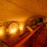 Ed eccoci quindi all�interno di larghi ambienti a volta collegati tra loro con passerelle in legno che sovrastano i millenari resti archeologici