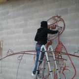 Michele Lorusso durante la realizzazione di Ciberwall I