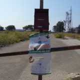 La locandina dell'iniziativa "Puliamo il buio 2013" in via Mitolo.