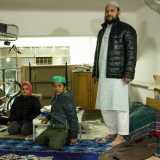 L�imam Abedin Mohammad Jainul: il giovane bengalese ha solo 28 anni e parla a stento l�italiano ma ci invita cordialmente a visitare la sede