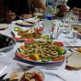 Cena a base di pesce a Himara