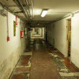 ...e la biblioteca, sono ormai chiuse e ridotte a magazzini fatiscenti con calcinacci e tubature a vista.