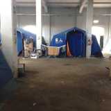 Le tende blu all�interno del capannone ex Set in via Brigata Regina, a Bari, nel quartiere Libert�. In questa tendopoli al coperto vivono i 150 migranti sistemati dal Comune per l�emergenza della seconda accoglienza, dopo l�inagibilit� dell�ex convento di Santa Chiara