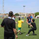 Un allenamento sull'erba sintetica dello stadio di Conversano sotto lo sguardo attento degli allenatori