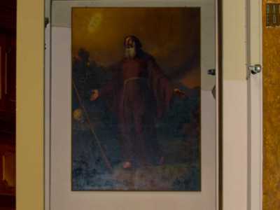 ...un ritratto di San Francesco da Paola orante dall'altra