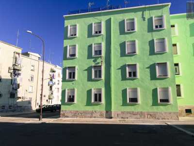 Qui le palazzine assumono un colore verde pastello