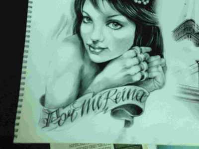 Un disegno realizzato per un tatuaggio che raffigura il volto della propria fidanzata