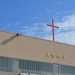 La grande croce e la scritta: Chiesa Evangelica Cinese in Italia
