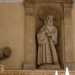 A chiudere la trabeazione, al centro di un timpano spezzato, si erge la statua di San Francesco da Paola incappucciato. Perch  proprio a questo santo che fu originariamente dedicata la chiesa