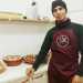 Il 23enne palestinese Ammar Abu Jassa, arrivato a Bari un anno fa e rimasto al Cara quasi un anno, ora cucina per Ethnic Cook