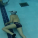 All'interno della piscina dello Stadio del nuoto barese un giocatore della Just Apnea, l'unica squadra di hockey subacqueo barese, nuota proiettato verso il disco di piombo con l'obiettivo di fare gol nella porta avversaria