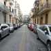 Via Maria Cristina di Savoia intasata dalla auto parcheggiate. Qui scorrono le acque pluviali che scendono dalla piazza del Convitto
